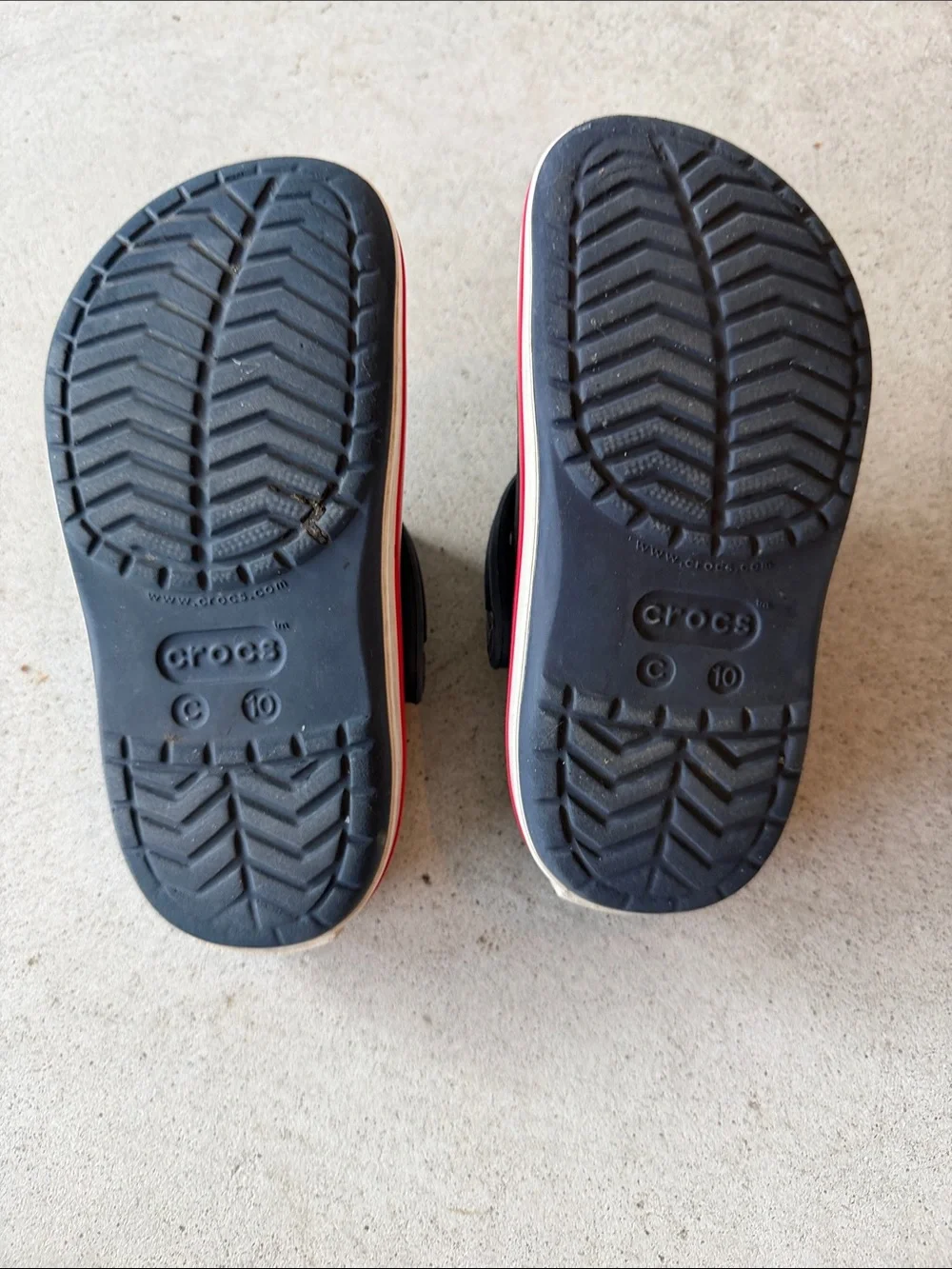 Kids Navy Slip-On CROCS with Red-Trim